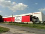 Coca-Cola HBC Polska, Radzymin - banner osłaniający z reklamą malowaną o wymiarach 12900cm x 540cm 